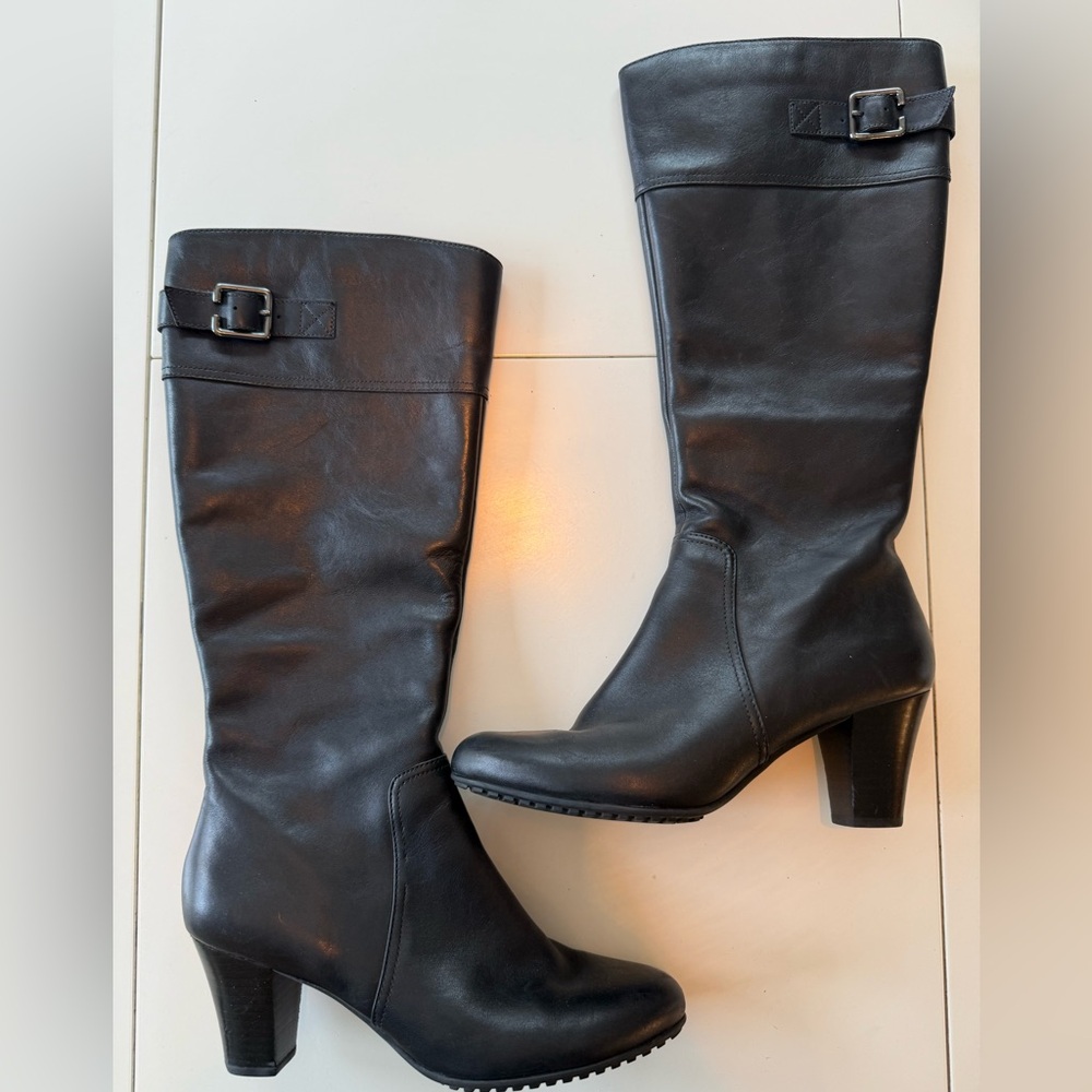 EUC.  Clarks knee high boots with heel.  Black leather.  Waterproof.  W8.5
